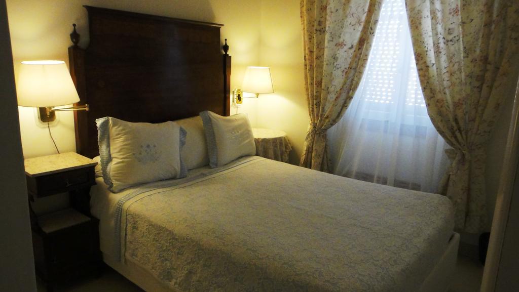 Casa Amarela Guesthouse Лагуш Номер фото